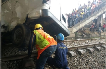 One Dead, as Train collide with 2 vehicles
