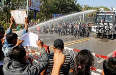 Myanmar coup: Police disperse protesters with water cannon