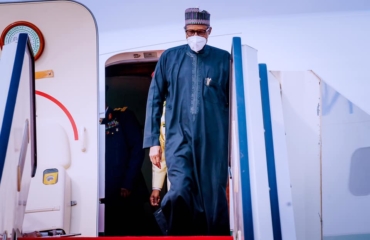 President Buhari returns from France