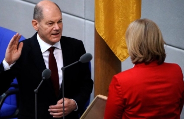 Olaf Scholz takes over from Merkel as German chancellor
