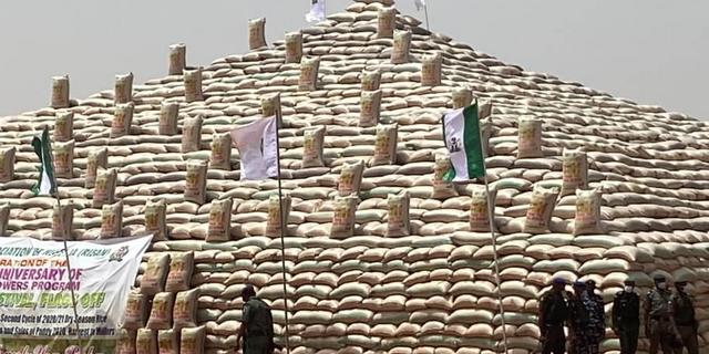 President Buhari unveils rice pyramids in Abuja