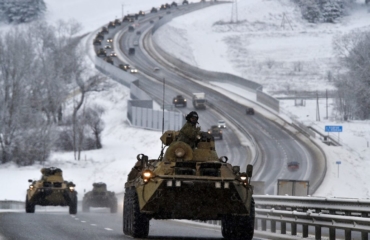 Russia pulls some troops back from Ukrainian border