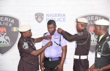 Police sack one officer wey use machete flog person